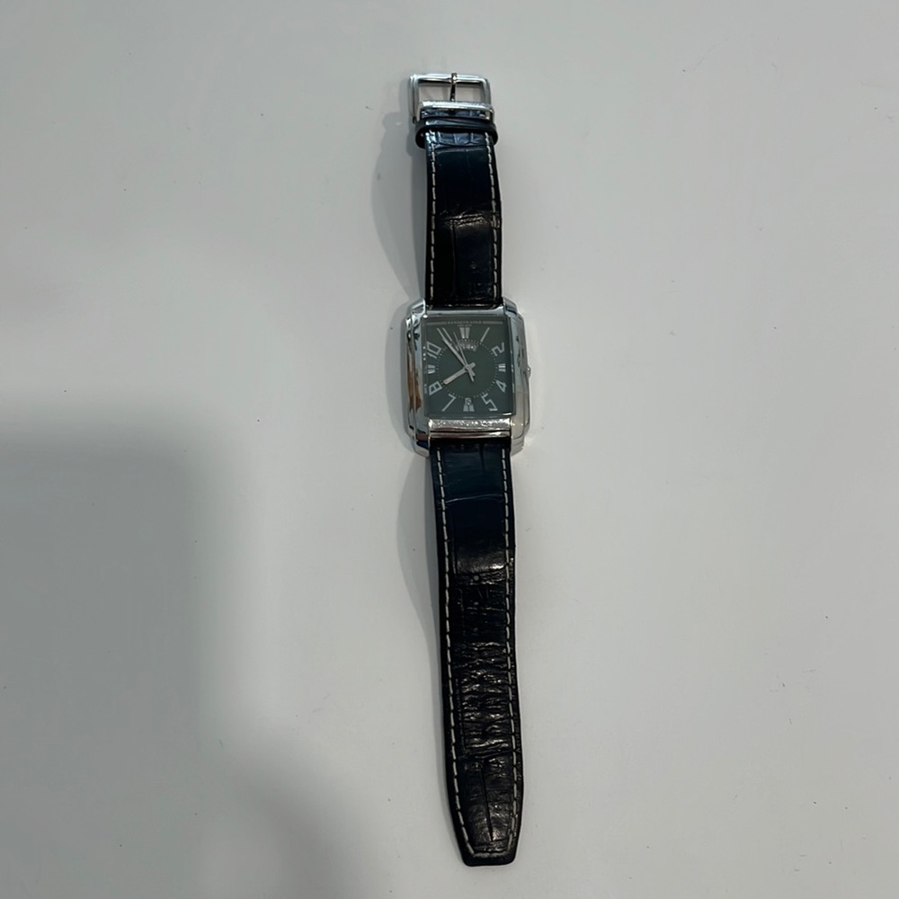 Kenneth Cole New York, Mens Leather stainless steel wristwatch. Fairly worn.